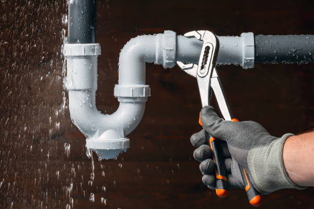 Professional Plumbing technician working in Fort Hill, PA